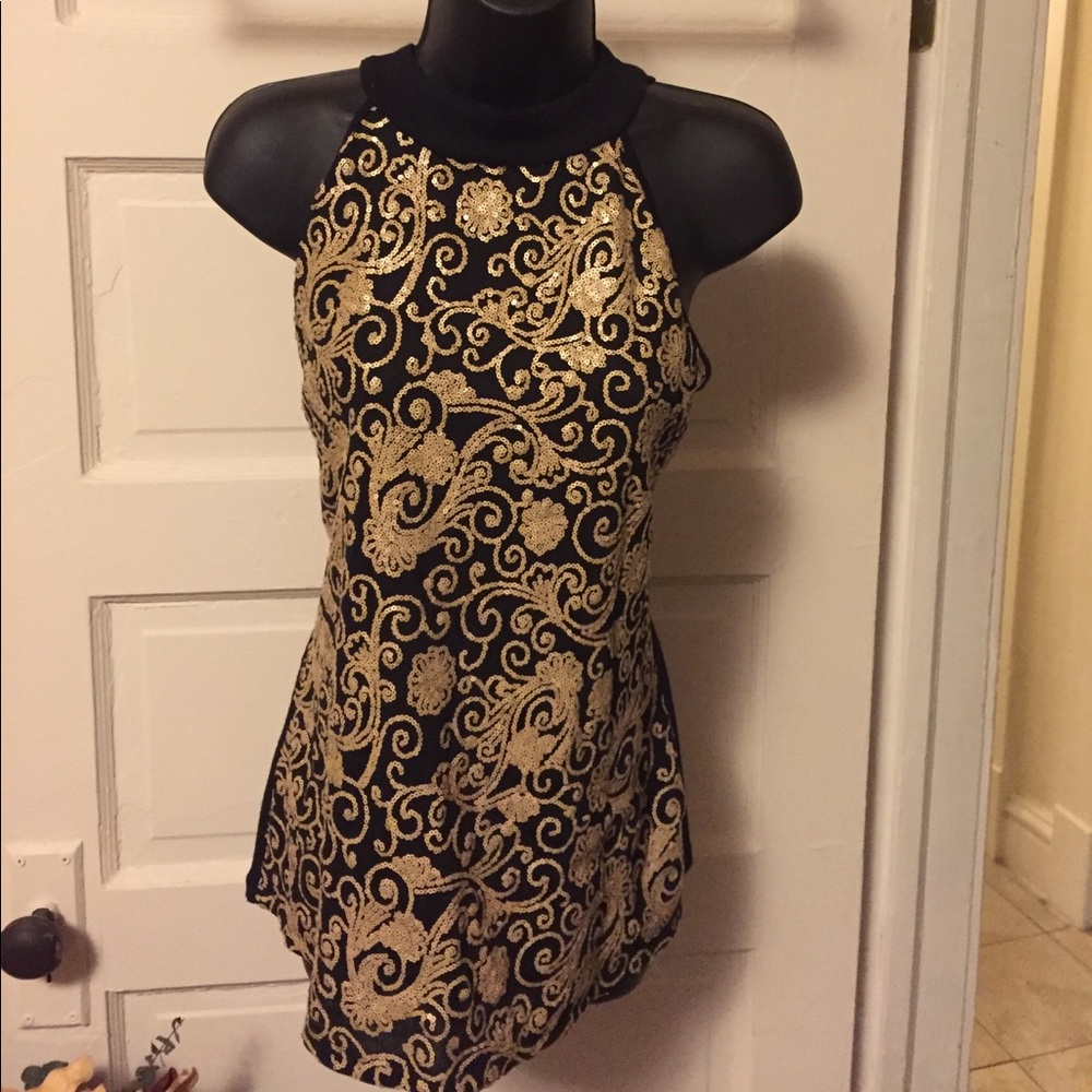 Women's size M top black with gold beading