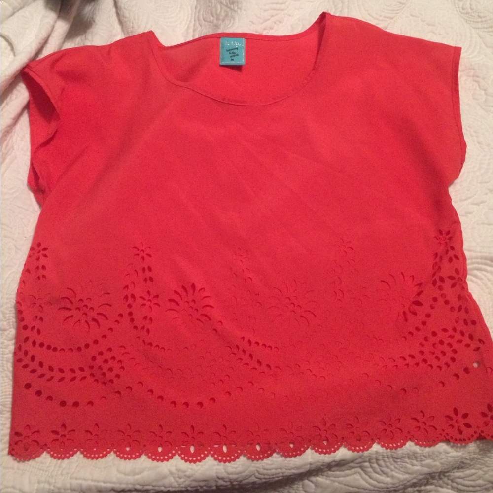 Coral top with cut out detail on front