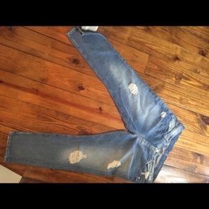 Seven for All Mankind distressed boyfriend jeans.