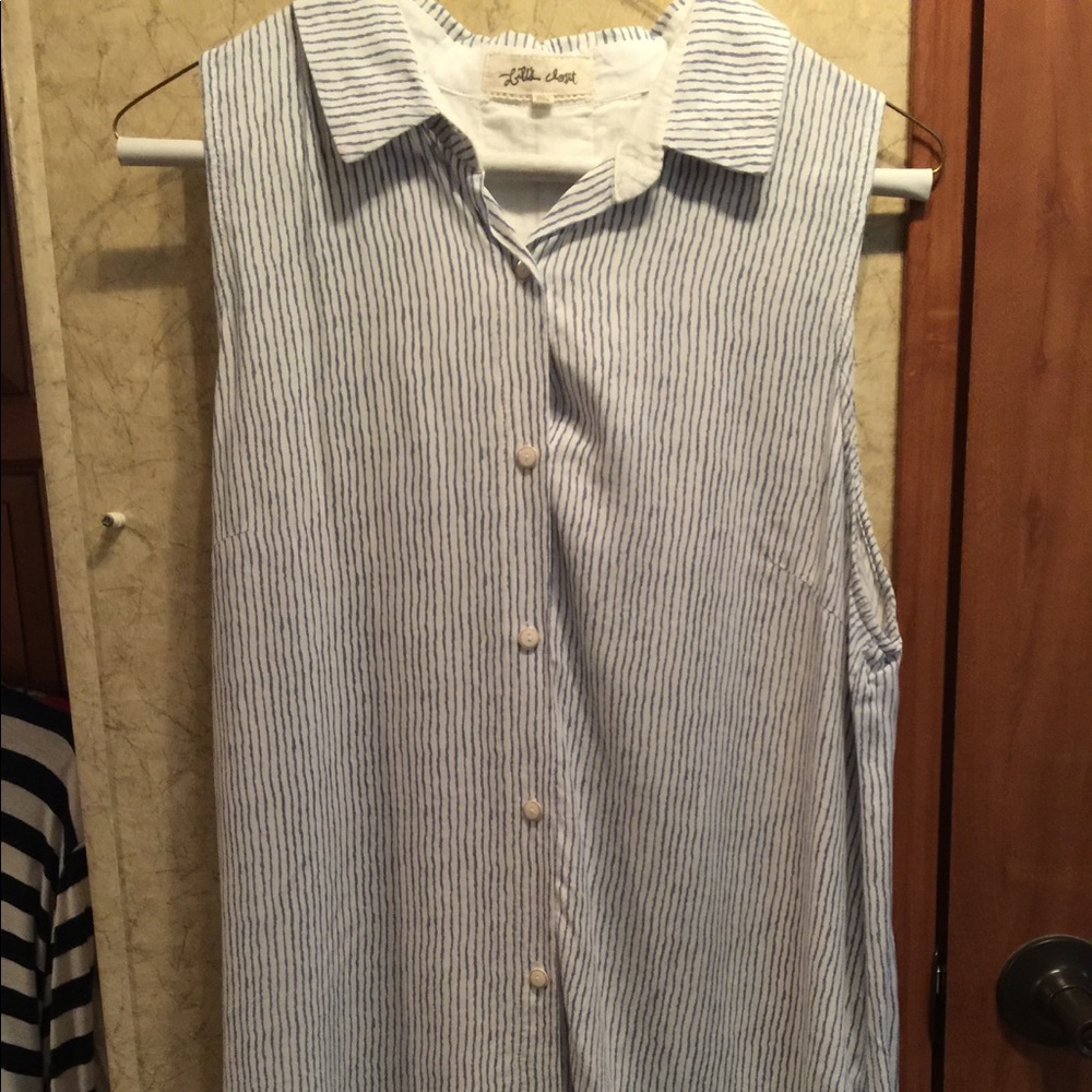 Blue and white sleeveless blouse