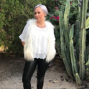 White faux fur vest