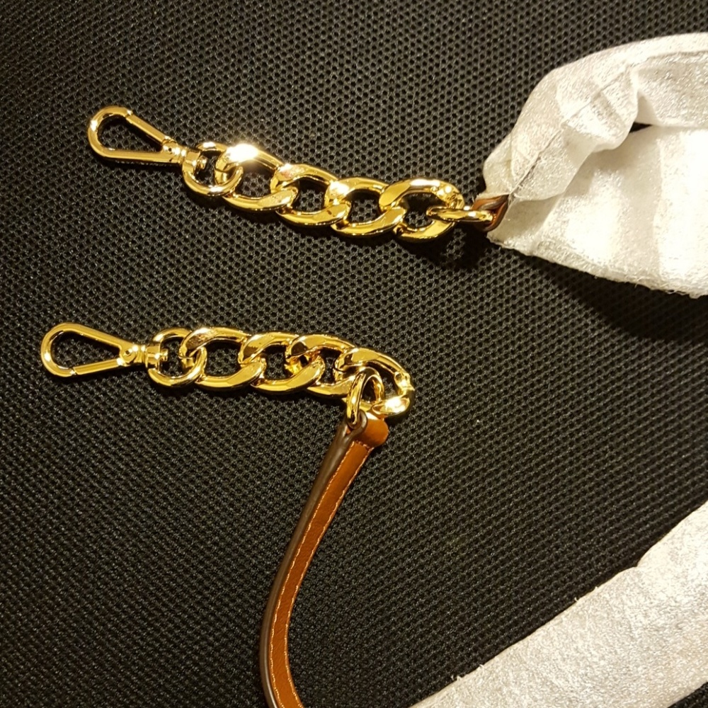 Brand new MK attachable/detachable strap.