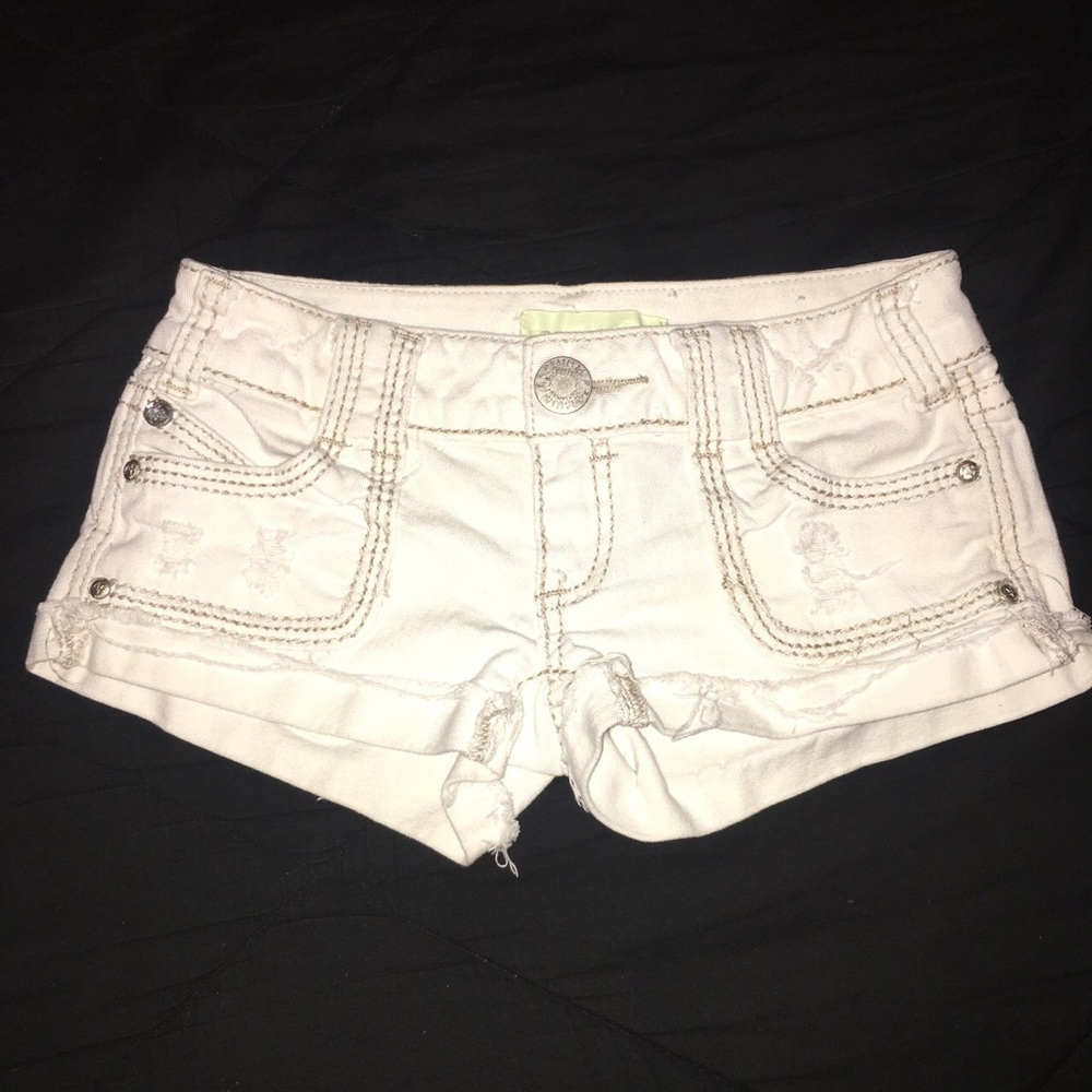 white cuffed shorts