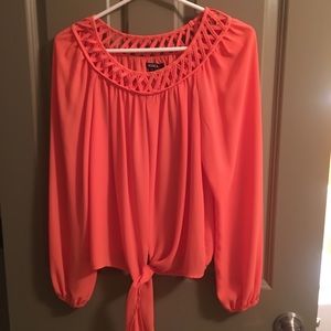 Orange flowy blouse