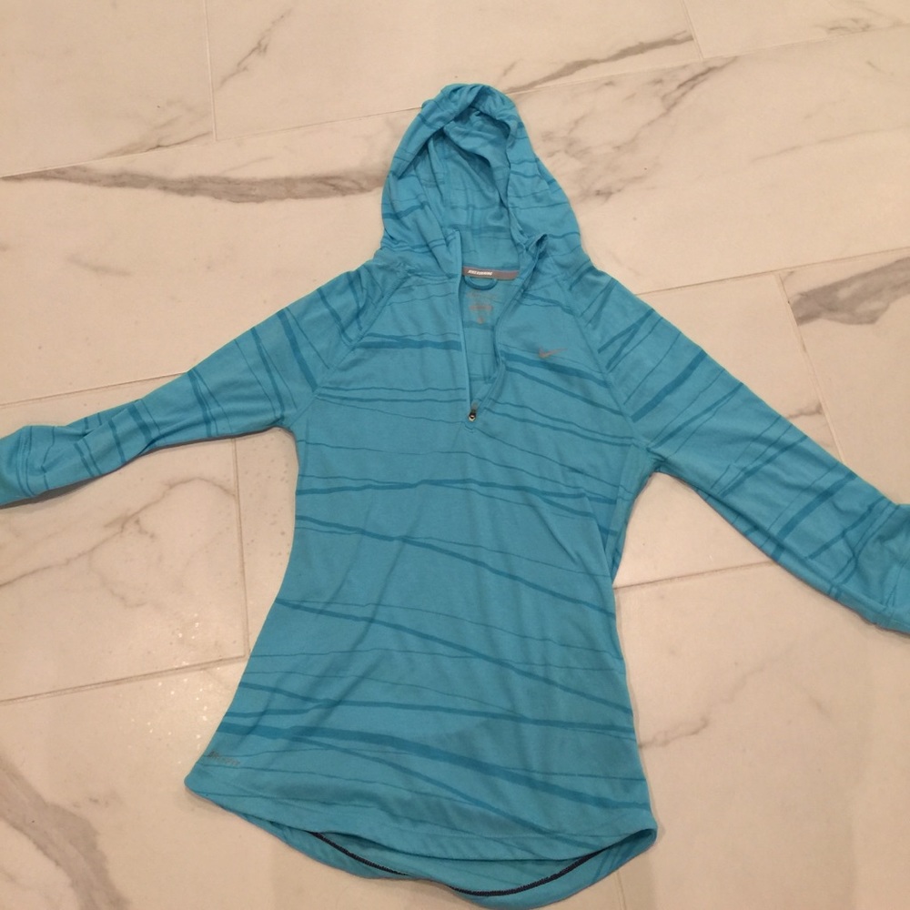 Hooded Blue Nike Dri-Fit zip up. Size small.
