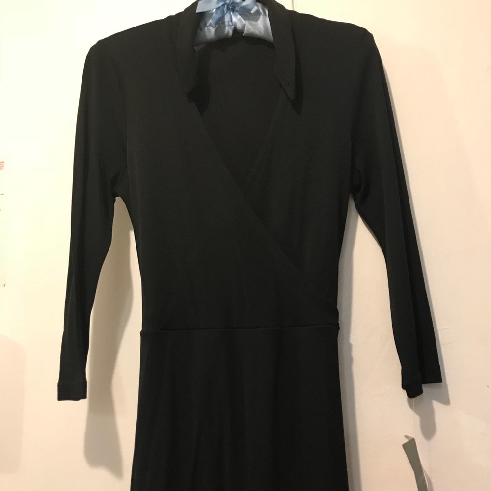 👗BOGO Sale - NWT Black wrap dress