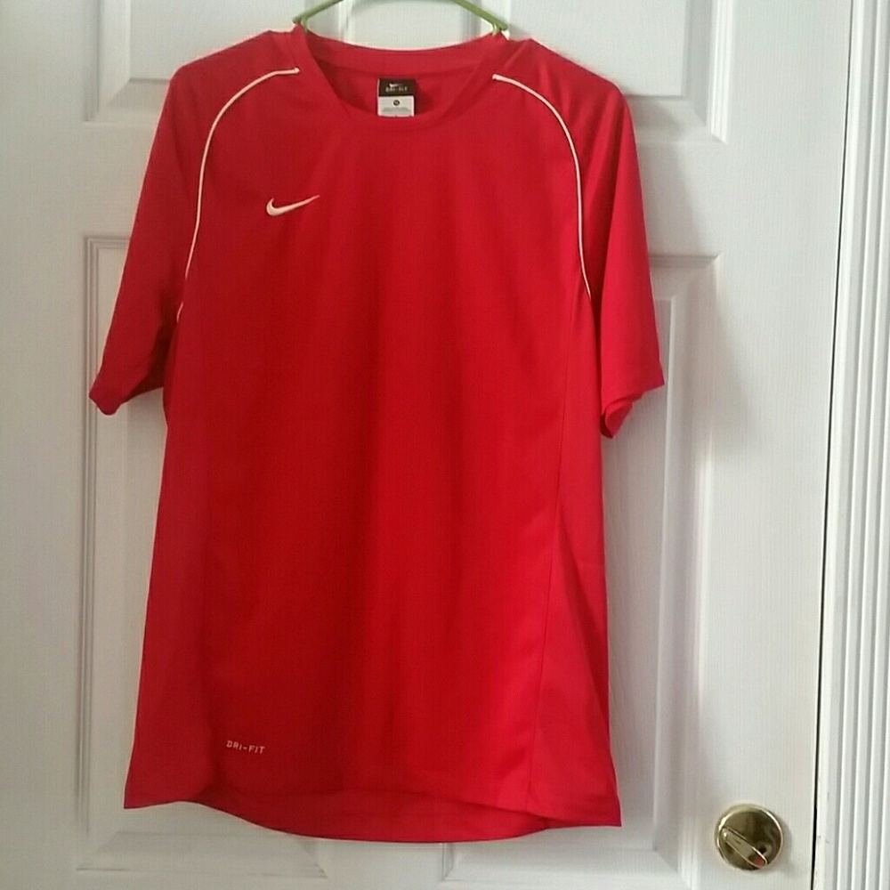 TWO NIKE TEE SHIRTS