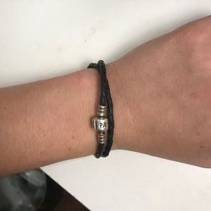 Authentic Pandora black rope bracelet.Silver clasp