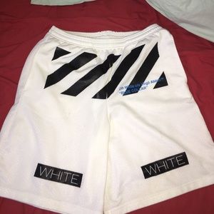 Off-white basketball shorts.