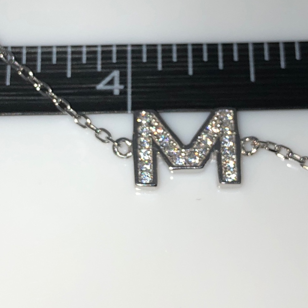 925 CZ Bracelet E & M Are left Price Firm