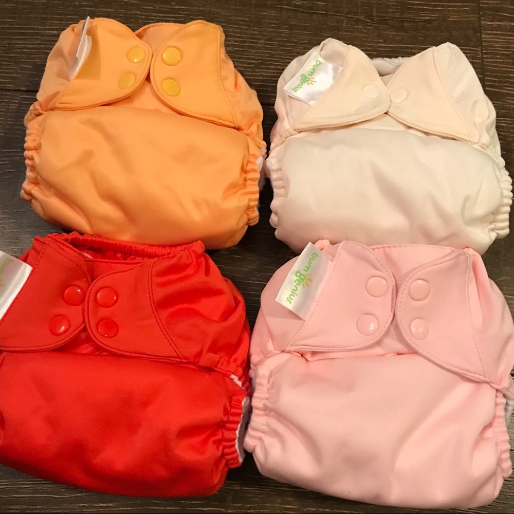 4 new/unused Bumgenius freetime diapers