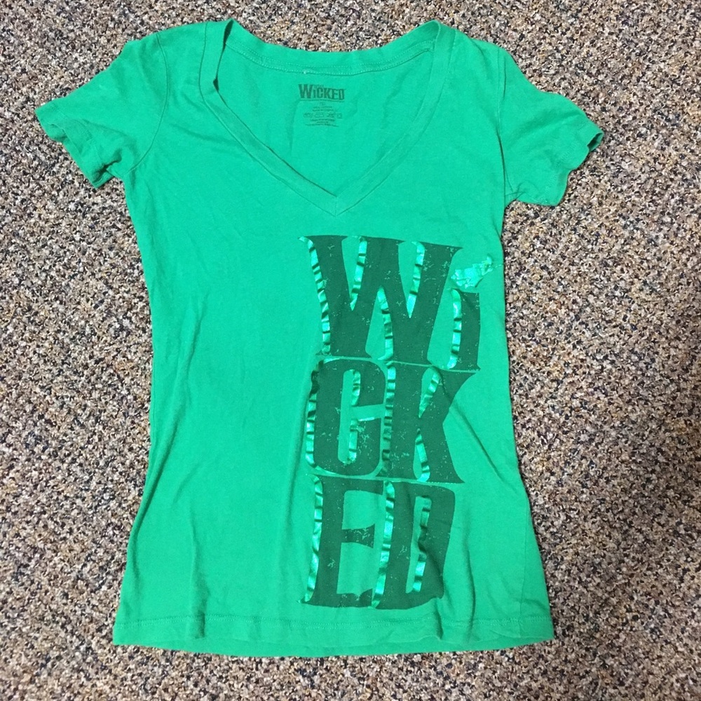 Green wicked t shirt.