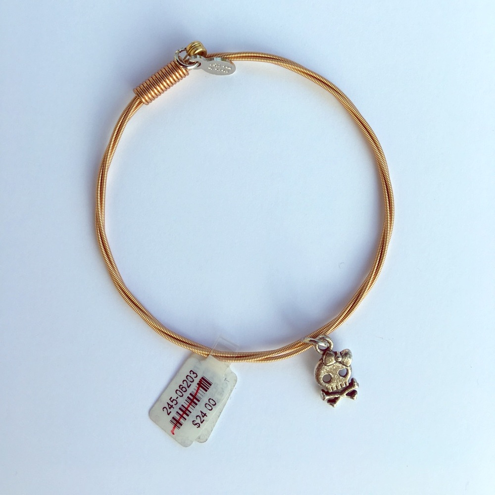 Stung inc skull bracelet in rose gold tone