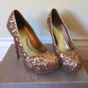 Coral sequin heels.