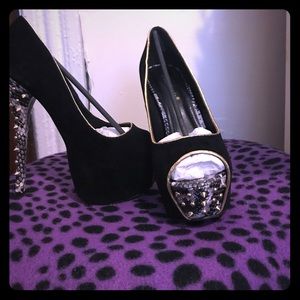 Black studded pumps