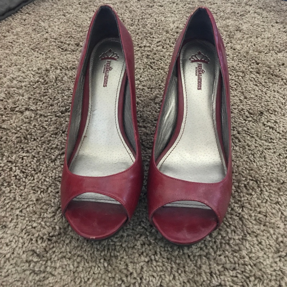 Red peep-toe pumps