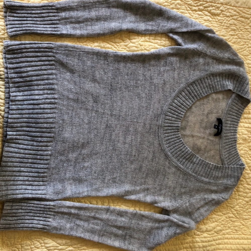 Sweater with silver metallic thread.