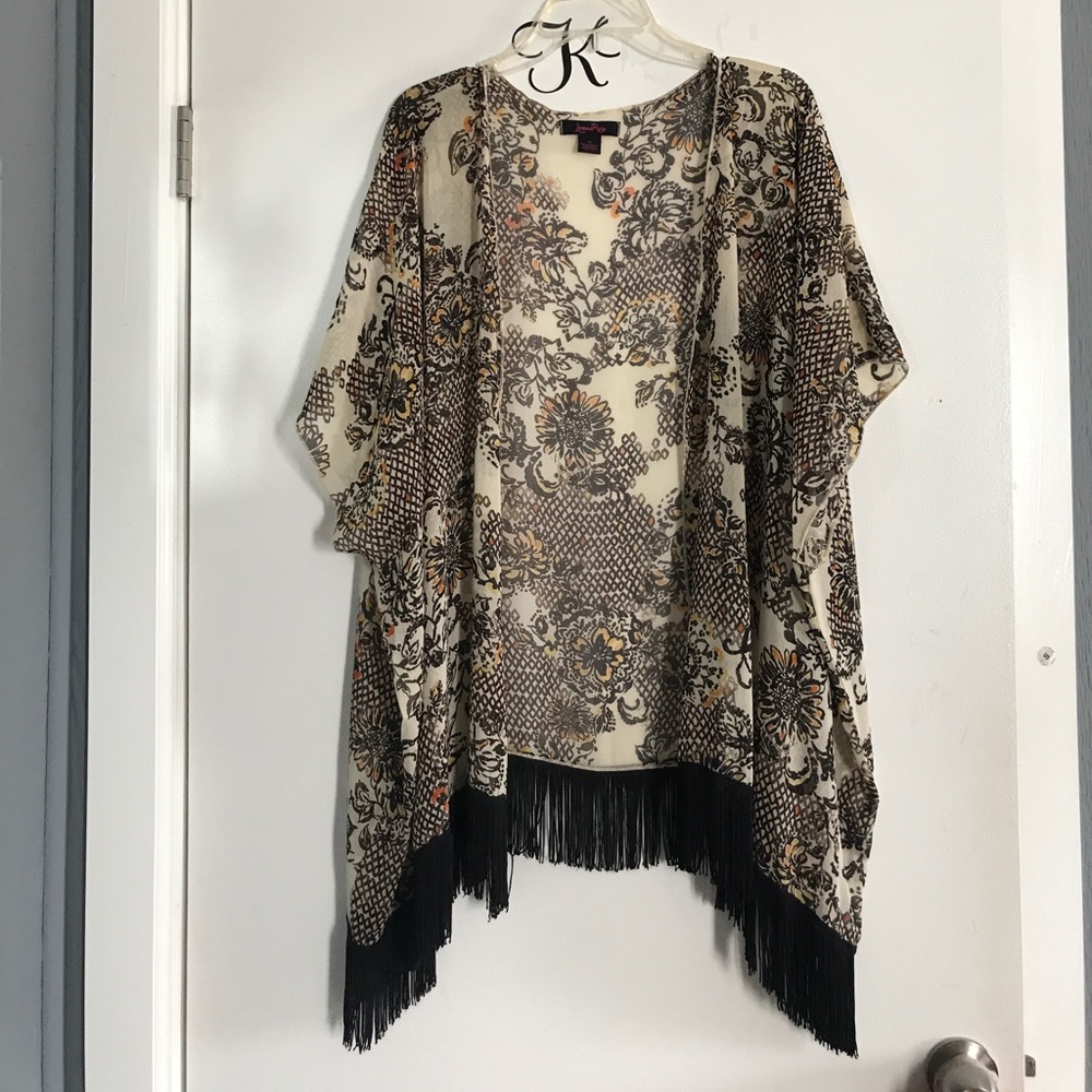 Tan kimono with fringe at the bottom