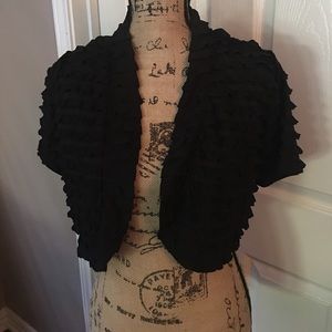 Black ruffled cardigan