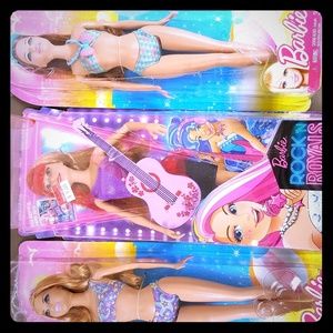 3 barbie dolls