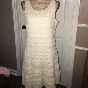 Beautiful lace like pattern dress.