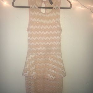 Peplum style dress with thick tank top straps.