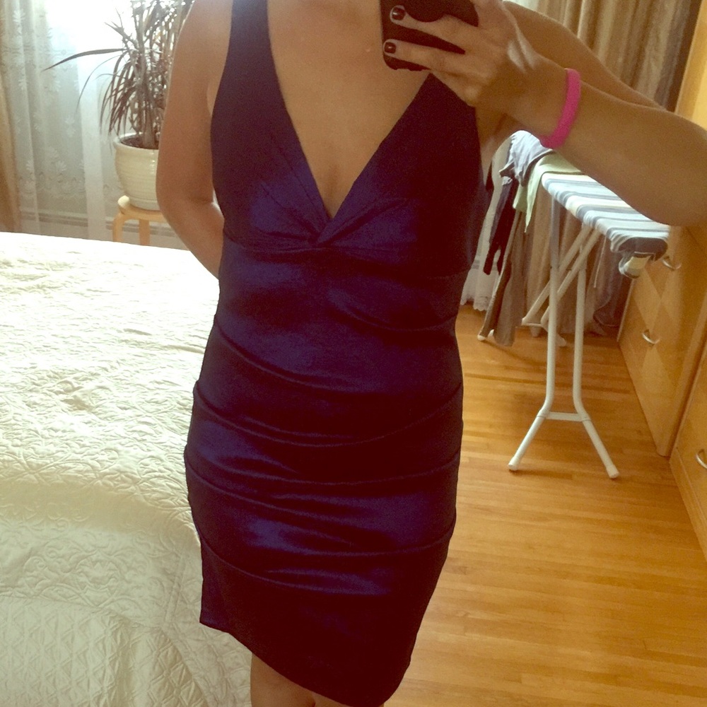 Knee-length navy blue, ruffled dress