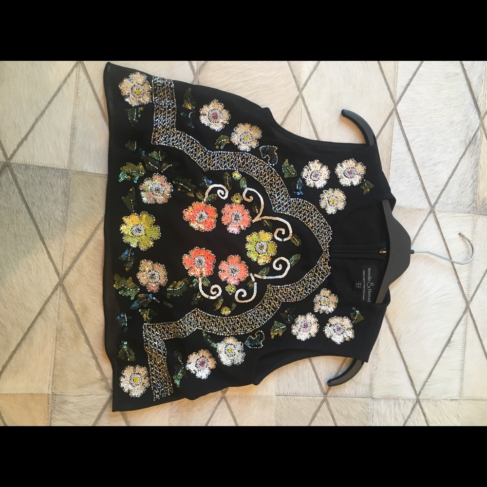 Black top with sequins and gems