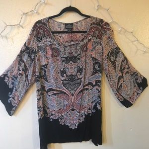 Flowy long sleeved dress with a paisley design.