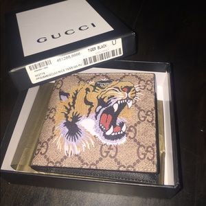 GUCCI tiger print bifold wallet