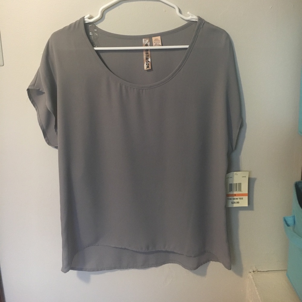 Eyeshadow. Small, flowy shirt new with tag!