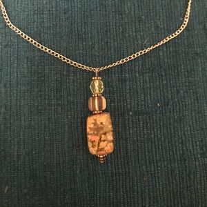 Beaded Pendant On a silver chain necklace