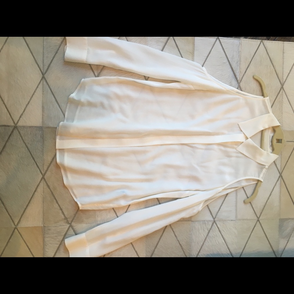 White cold shoulder blouse.