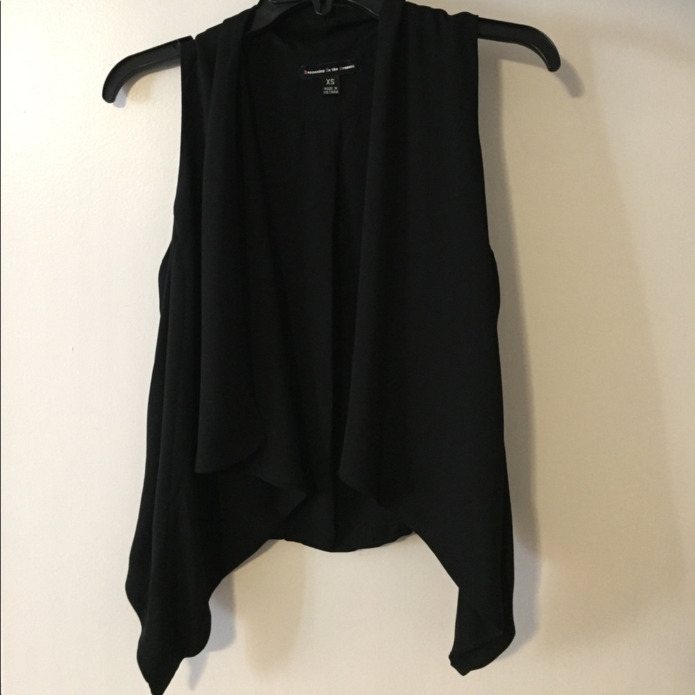 Black asymmetrical front vest