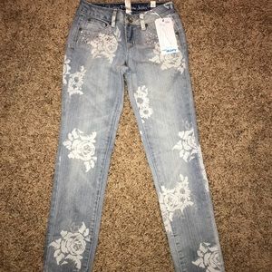 Jeans with flowers on them