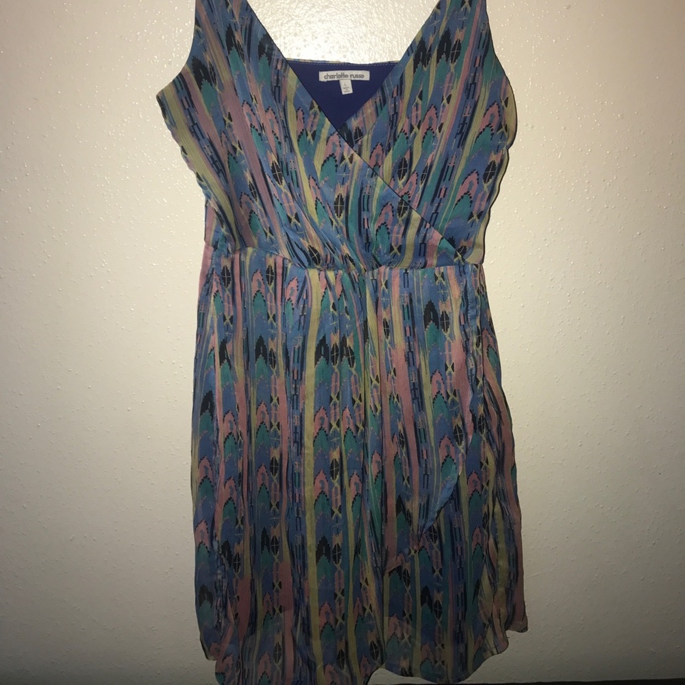 Brightly colored and designed V-necked dress