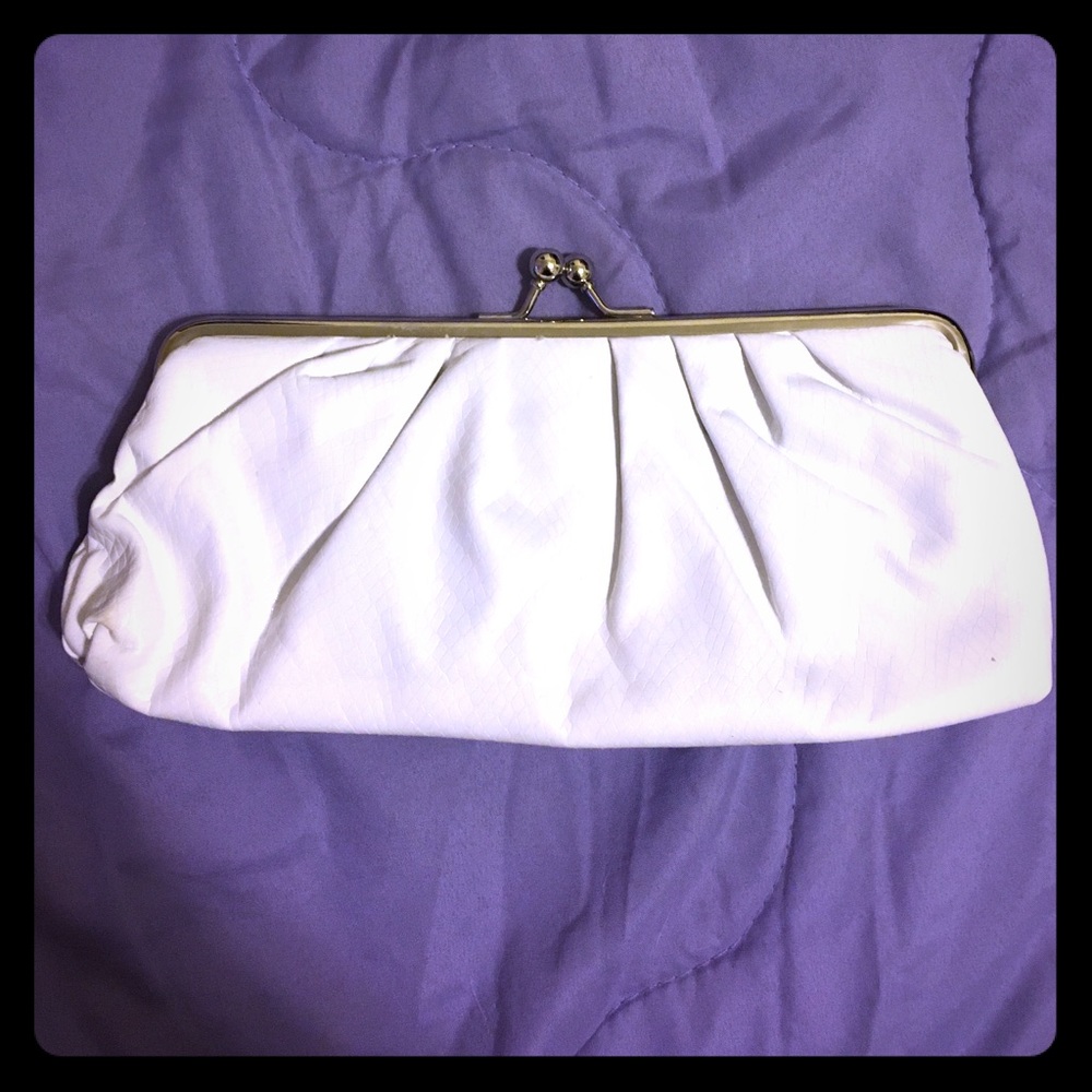 All white Aldo clutch.