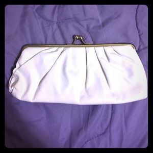 All white Aldo clutch.