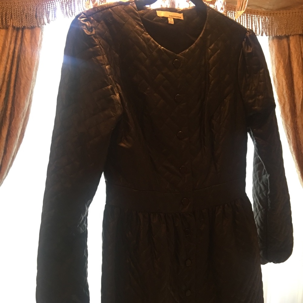 Leather like quilted coat. Worn once