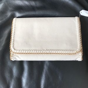 Brand new cream and gold clutch