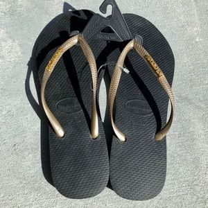 New black/gold havaianas brazil 39/49 flip flops