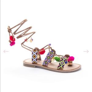 Leather Sandals with pom poms