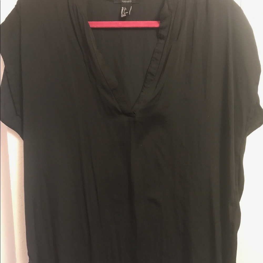 Flowy black V-neck top.
