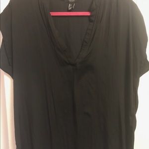 Flowy black V-neck top.