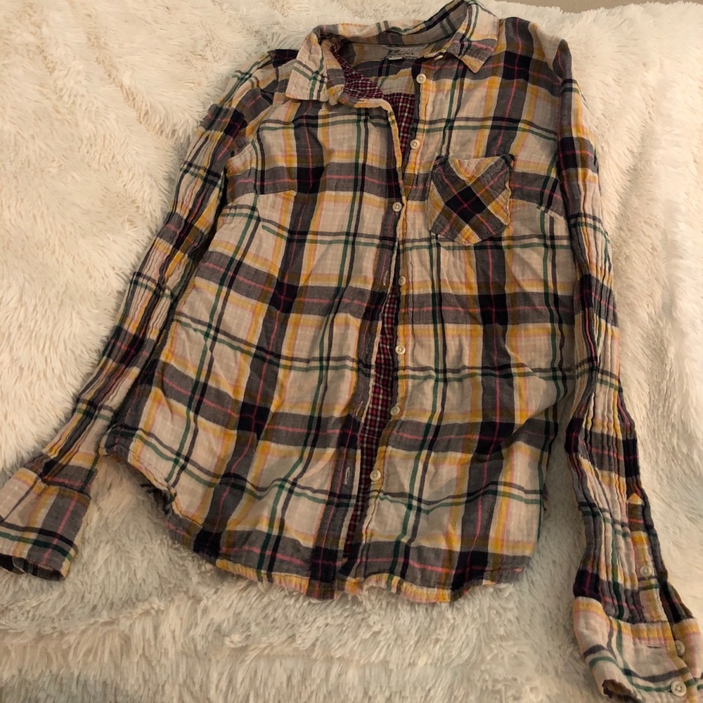 Long sleeve plaid shirt.