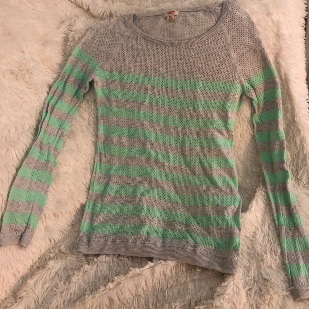 Long sleeve striped shirt.