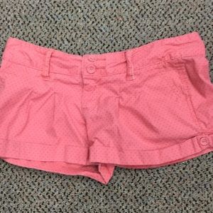 HOLLISTER CORAL SHORTS.