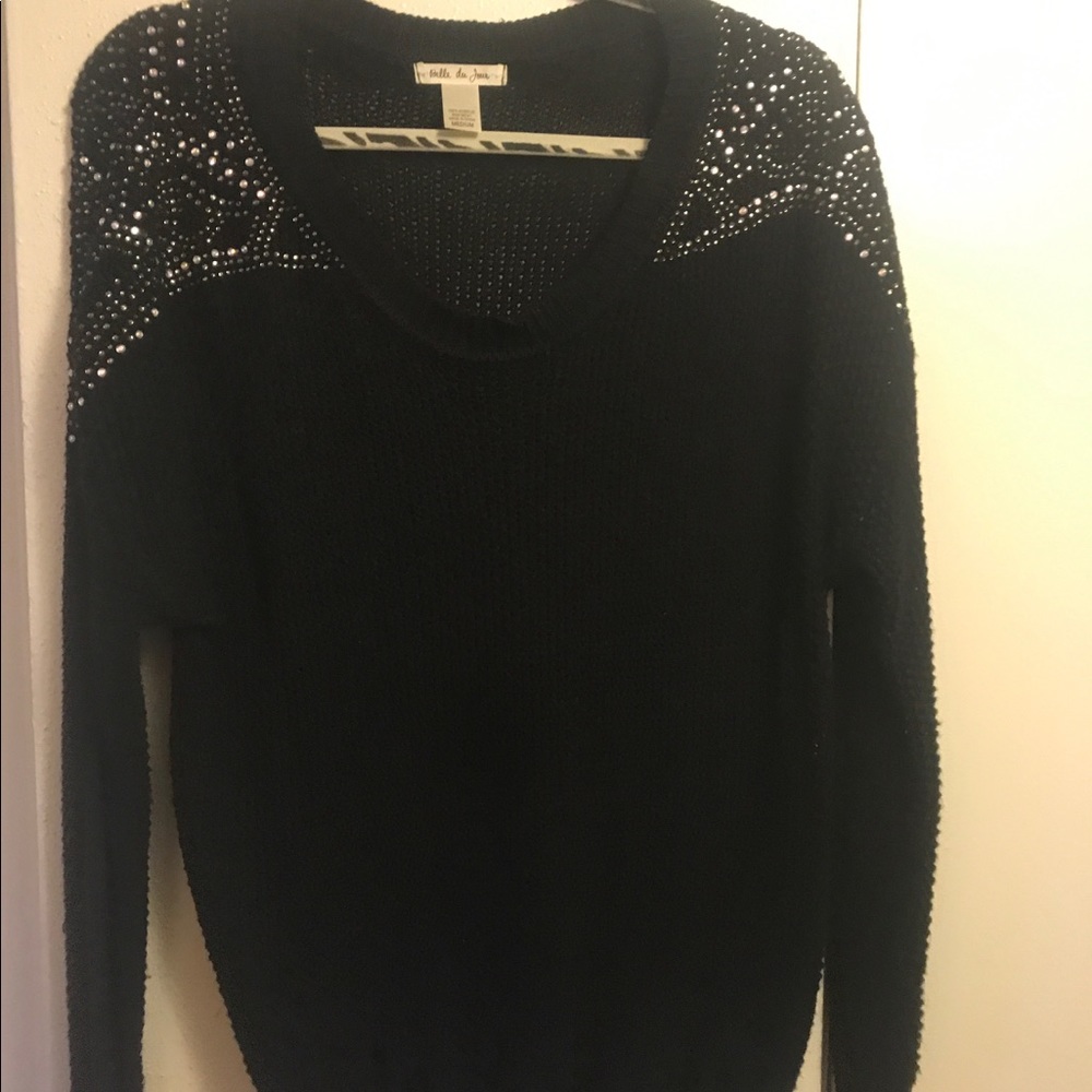 Black sweater with embellishment on the shoulders