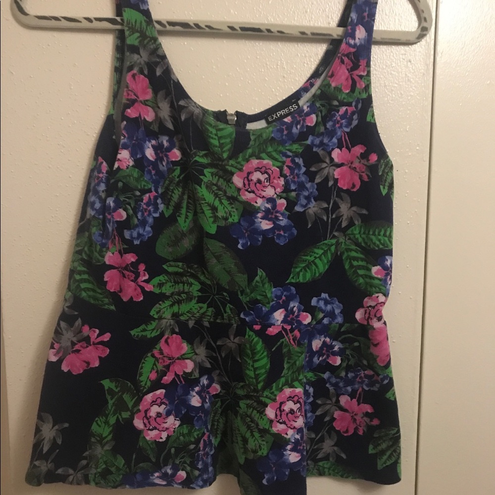 Floral peplum top with a zipper in the back