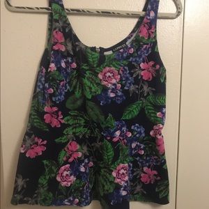 Floral peplum top with a zipper in the back